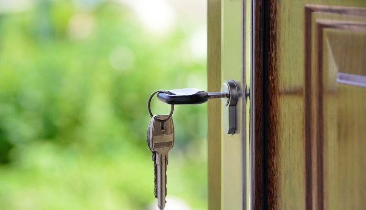 Keys in the door of a new home